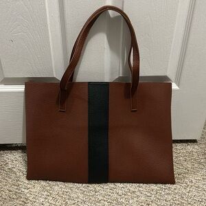 Faux leather shoulder bag. Brown with black accent stripe. Great for laptops